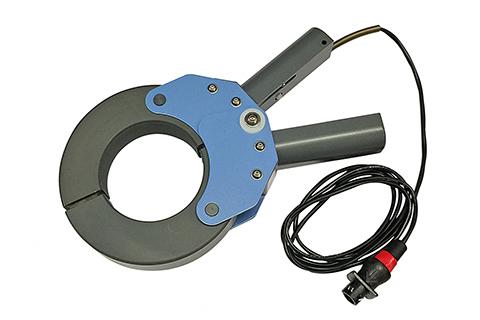 A blue and black device with a wire attached to it.