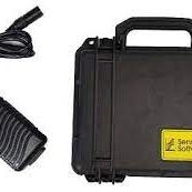 A black case with a power supply and a charger.